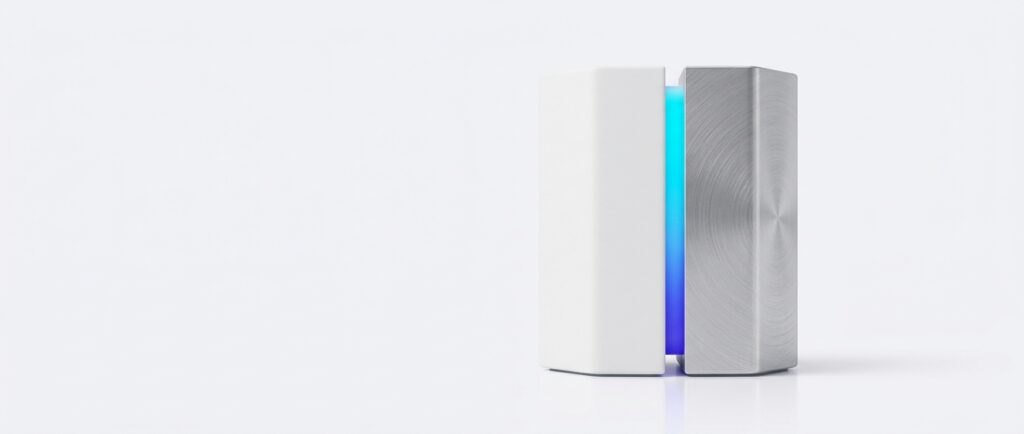 A hexagonal prism split into 2 unequal halves, 1 white ceramic and 1 brushed aluminium, with indigo to cyan light in the gap, on a flat light grey background